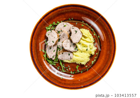 Roaast pork tenderloin meat steak on a plate with mash potato. Isolated on white background. Roaast pork tenderloin meat steak on a plate with mash potato. Isolated on white background. 103413557