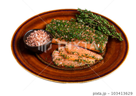 Salmon Gravlax cured with dill and pink salt on rustic plate. Isolated on white background. Salmon Gravlax cured with dill and pink salt on rustic plate. Isolated on white background. 103413629