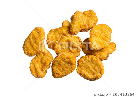 Fried crispy chicken nuggets on kitchen table. Isolated on white background. 103413864