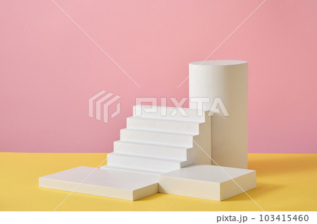 A set of white podium in different shapes. Mock-up for exhibitions or presentation of cosmetic products or packaging A set of white podium in different shapes. Mock-up for exhibitions or presentation of cosmetic products or packaging 103415460
