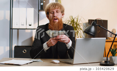 Rich pleased boss businessman waving money dollar cash, success career lottery winner, income wealth 103420629