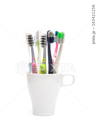 Pile of Used and Dirty Toothbrush on iSolated White Background, Unhealthy Oral Health Care Equipment Pile of Used and Dirty Toothbrush on iSolated White Background, Unhealthy Oral Health Care Equipment 103421256