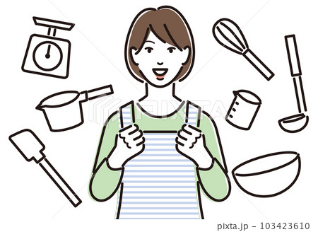 製菓道具とやる気満々のエプロン姿の女性 103423610