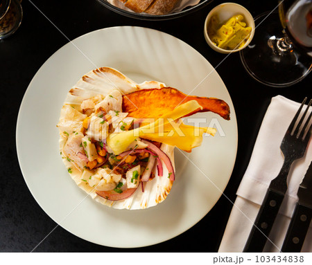 Peruvian food: Fish ceviche on white plate 103434838