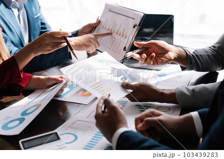 Business team collaboration discussing working analyzing with financial data and marketing growth report graph in team, presentation and brainstorming to strategy planning making profit of company Business team collaboration discussing working analyzing with financial data and marketing growth report graph in team, presentation and brainstorming to strategy planning making profit of company 103439283