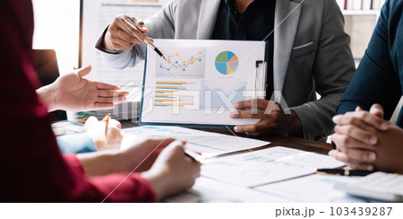 Business adviser meeting to analyze and discuss the situation on the financial report in the meeting room.Investment Consultant, Financial advisor and accounting concept 103439287