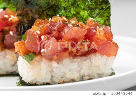 Japanese hand rolls with spicy tuna fish Japanese hand rolls with spicy tuna fish 103445644