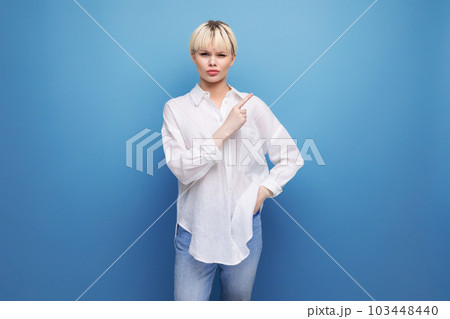 young caucasian blonde secretary woman dressed in a white shirt is inspired by an idea. people 103448440