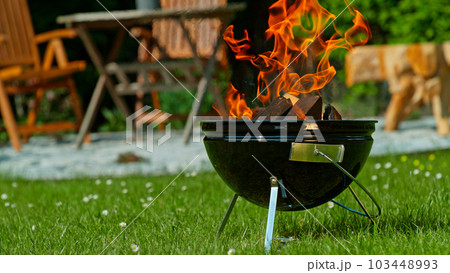 Heating Up the Garden Grill during Sunny Day 103448993