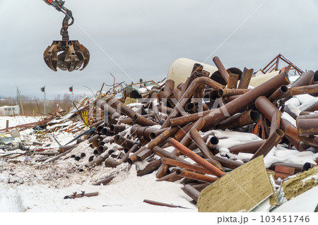Industrial scrap metal. Waste of human activity. Scrap metal at the recycling site 103451746