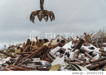 Industrial scrap metal. Waste of human activity. Scrap metal at the recycling site Industrial scrap metal. Waste of human activity. Scrap metal at the recycling site 103451758