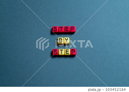 Step by step - word concept on cubes, text Step by step - word concept on cubes, text 103452184