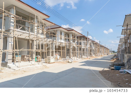 construction residential new house in progress at building site housing estate development construction residential new house in progress at building site housing estate development 103454733