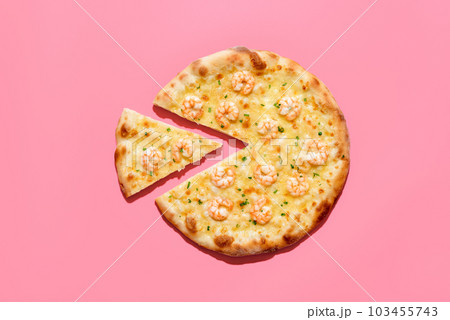Homemade shrimp pizza isolated on a pink background. Sliced pizza top view Homemade shrimp pizza isolated on a pink background. Sliced pizza top view 103455743