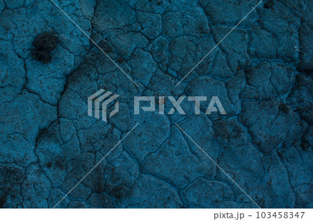 Dark blue background with cracks and hollows 103458347