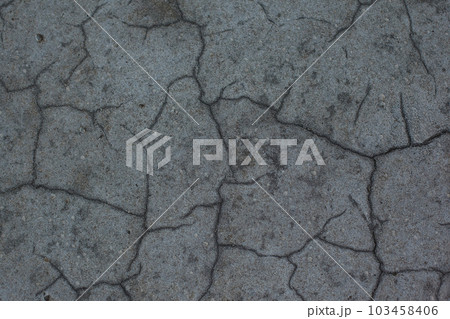 Dark gray background with cracks and hollows 103458406