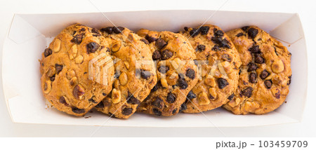 cookies with chocolate and hazelnuts on a white background cookies with chocolate and hazelnuts on a white background 103459709