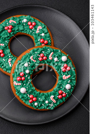 Delicious Christmas gingerbread on a dark textural background 103461143