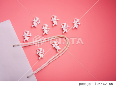 Fashion spring accessories for woman - banner. Small mint green handbag (purse), heart shaped sunglasses and flowers on pastel pink background. Free copy (text) space. Fashion spring accessories for woman - banner. Small mint green handbag (purse), heart shaped sunglasses and flowers on pastel pink background. Free copy (text) space. 103462160