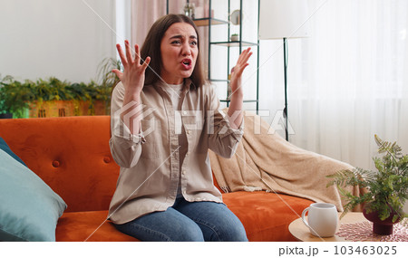 Scared woman screams from stress tension problems panic horror hopelessness fear surprise shock Scared woman screams from stress tension problems panic horror hopelessness fear surprise shock 103463025
