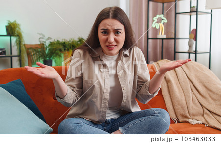 Pretty woman girl asking why, what reason of failure demonstrating disbelief irritation by troubles Pretty woman girl asking why, what reason of failure demonstrating disbelief irritation by troubles 103463033