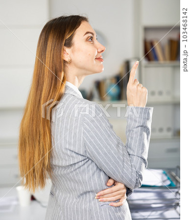 Business woman expresses different emotions while working in office Business woman expresses different emotions while working in office 103468142