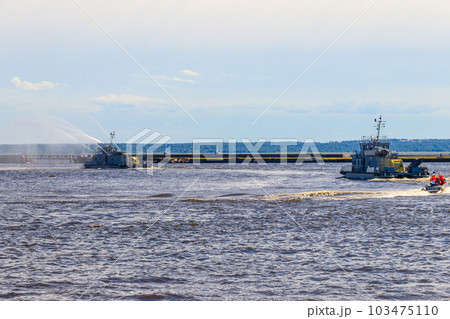 Extinguishing a burning ship during naval exercises 103475110