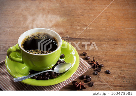 Coffee on grunge wooden background Coffee on grunge wooden background 103478983