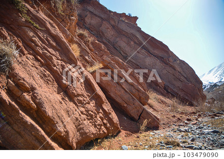 Beautiful view of cliffs from yellow red limestone. Kyrgyzstan. 103479090