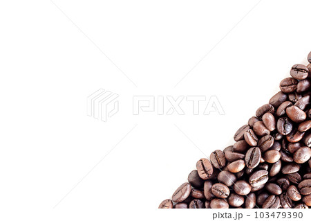 Top view with roasted coffee beans isolated on white table background area for copy space. Top view with roasted coffee beans isolated on white table background area for copy space. 103479390