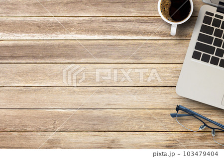 Cup of coffee on a office desk or wood table background. 103479404