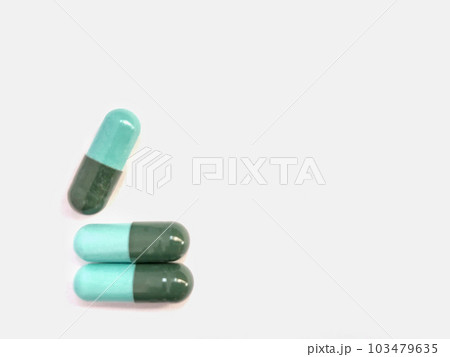 Close up pills medication isolated on white background 103479635
