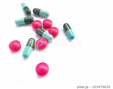 Close up pills medication isolated on white background Close up pills medication isolated on white background 103479638