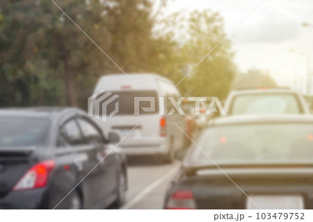Blurred row of car on evening treaffic jam hour and copyspace 103479752