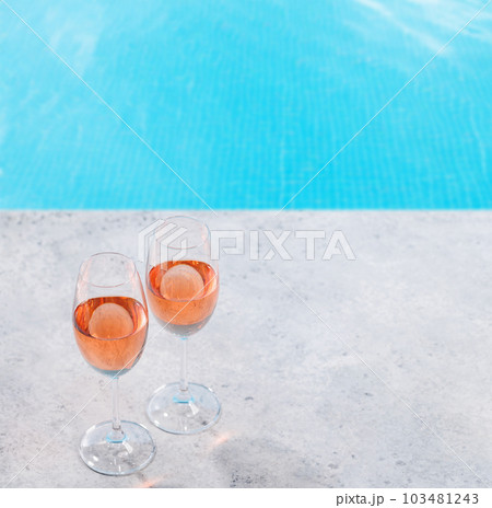 Refreshing rose wine by the pool on a sunny day 103481243
