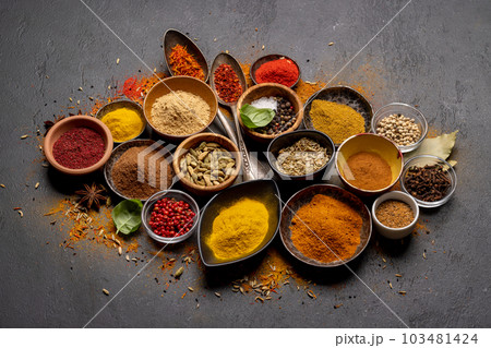 Various spices in bowls and spoons Various spices in bowls and spoons 103481424