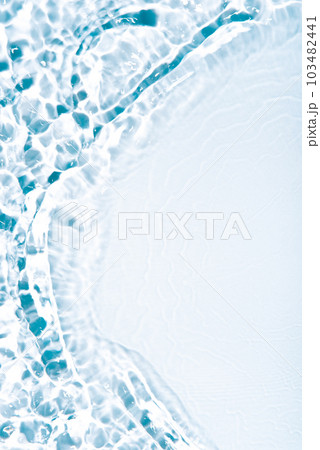 The texture of water on a white background in bright sunlight. 103482441