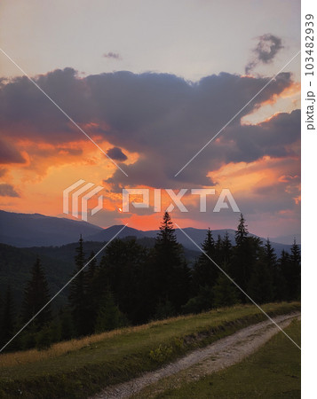 colorful sunset on top of ukrainian mountain 103482939