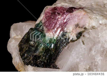 macro mineral tourmaline stone on black background 103484436