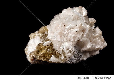 Macro mineral stone Baryta On Fluorite On a black background 103484492