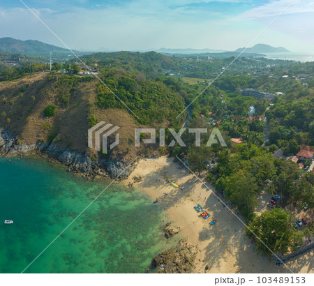 aerial panorama view above turquoise sea around Nui beach small beach surrounded by tourist attractions. Nui beach is the good place for swimming snorkeling and sea canoe. turquoise sea background. aerial panorama view above turquoise sea around Nui beach small beach surrounded by tourist attractions. Nui beach is the good place for swimming snorkeling and sea canoe. turquoise sea background. 103489153