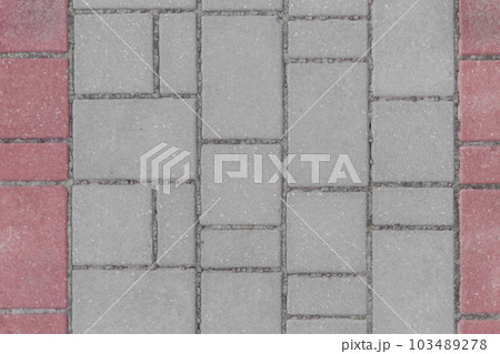 Gray sidewalk tile street stone city road abstract urban pattern color red or pink design texture paving background 103489278