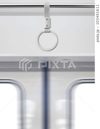 Handle loop in the train. This image is focus on the center handle loop Handle loop in the train. This image is focus on the center handle loop 103491611