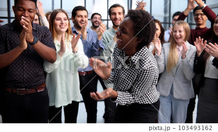Business people clapping their hands after a seminar Business people clapping their hands after a seminar 103493162