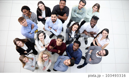 large group of diverse young people looking up hopefully large group of diverse young people looking up hopefully 103493316