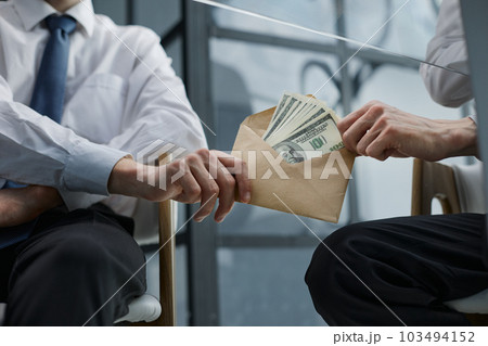 Transfer of money in an envelope in men Transfer of money in an envelope in men 103494152