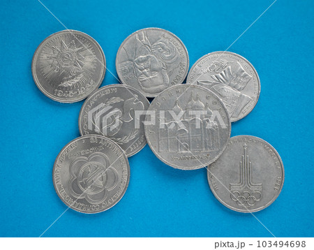 Soviet ruble coins, commemorative issue on blue background. World coins. Old Anniversary Rubles Soviet ruble coins, commemorative issue on blue background. World coins. Old Anniversary Rubles 103494698