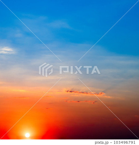 Bright sunrise on the blue sky. Bright sunrise on the blue sky. 103496791