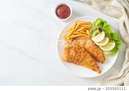 Homemade Breaded Weiner Schnitzel with Potato Chips 103503111