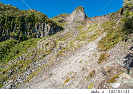 The loose rock face and landslide area of Boomerang Slip track in Egmont national park, New Zealand. In this national park has many route for hiking one day is Pouakai Crossing. 103505331